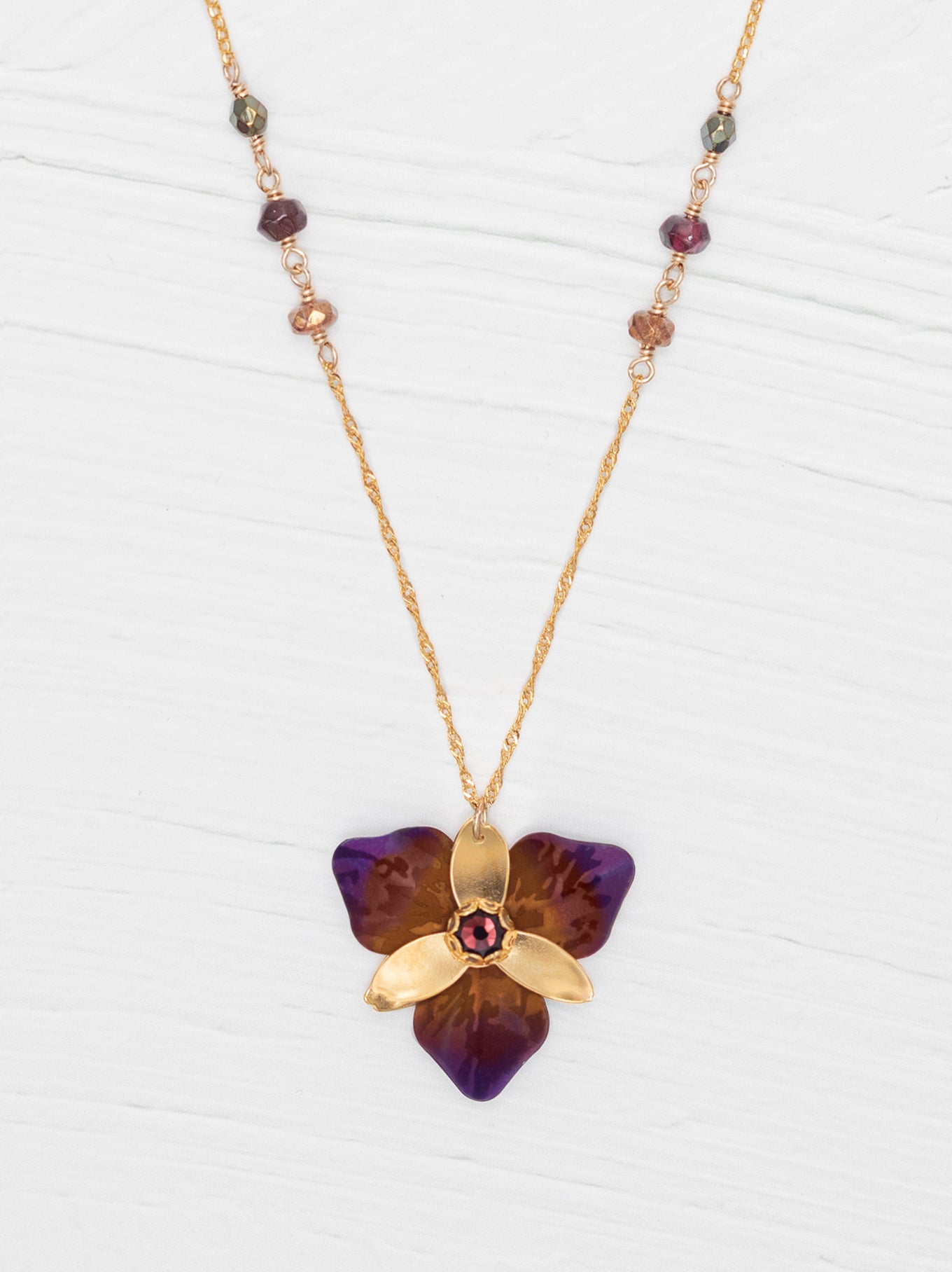 The Orla Pendant Necklace features hand-colored – Holly Yashi
