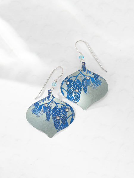 Lasered art gives the niobium Clara Ornament Earrings their