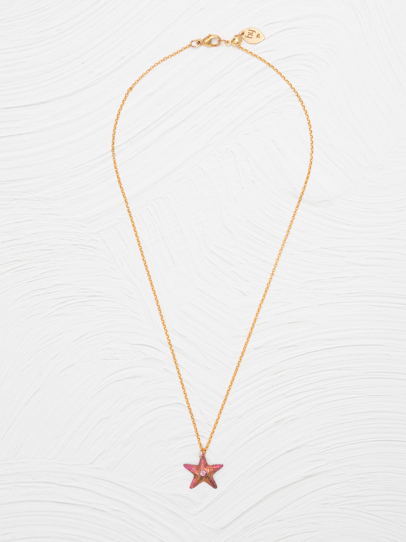 The Carmel Sea Star Necklace For Kids in hand-colored niobium