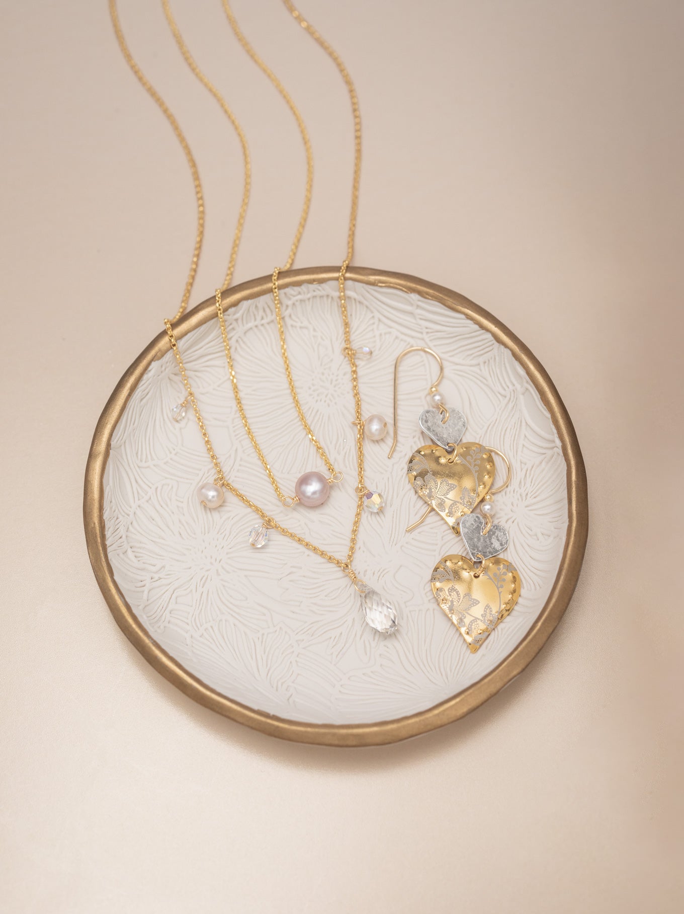 The Victoria Necklace delights with black and red crystals