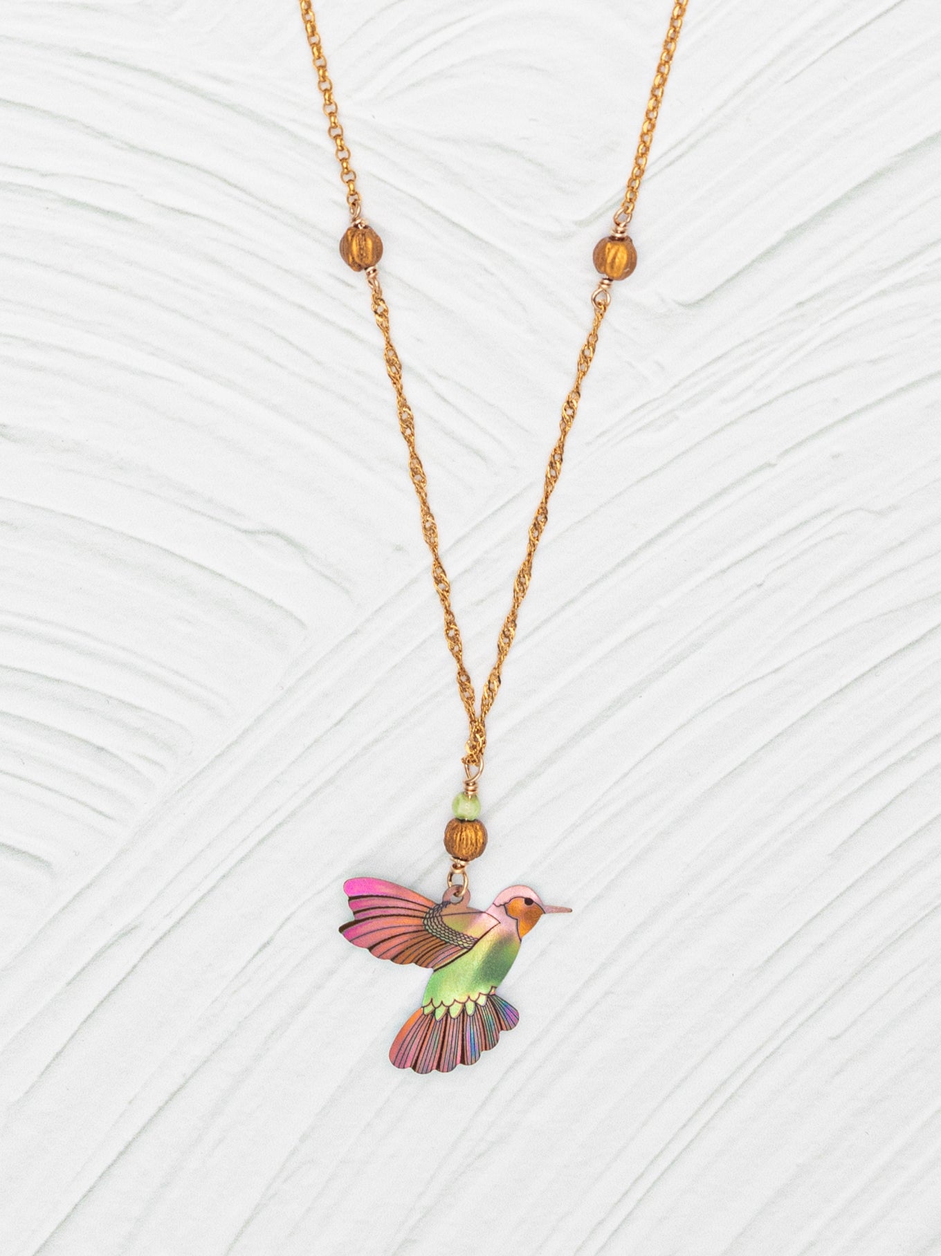 Picaflor Pendant Necklace with niobium hummingbird. – Holly Yashi