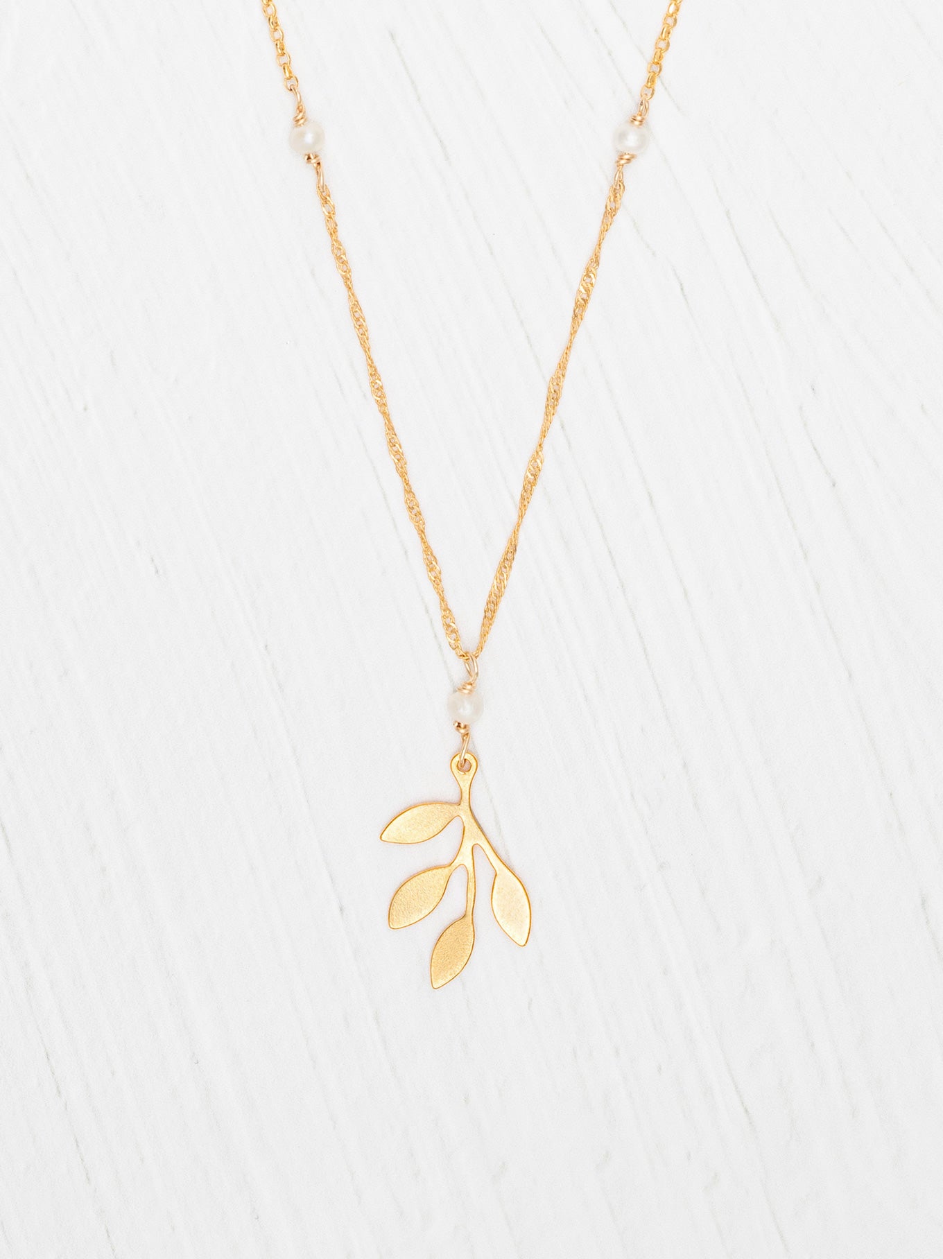 Signature Pendant | Holly Yashi's Iconic Four-Leaf Emblem Reimagined