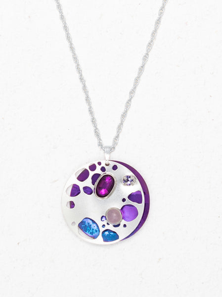 The Ocean Depths Necklace features niobium, crystals, and glass